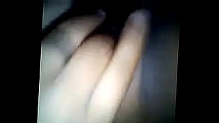 husband touch her wife breast on sleep