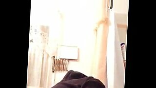japanese cutie is in a changing room being filmed by a hidd