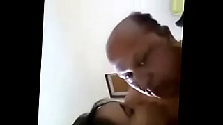 daughter jumps on daddy in bed